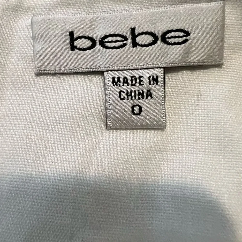 Y2K Bebe white tennis high waisted pleated mini skirt size 0